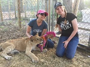 Leah and Kathleen with a Liger at CARE