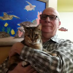 sara practitioner ashley humphrey holding a cat