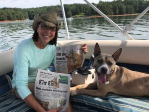 SARA practitioner Candace Solyst and her dog on a boat