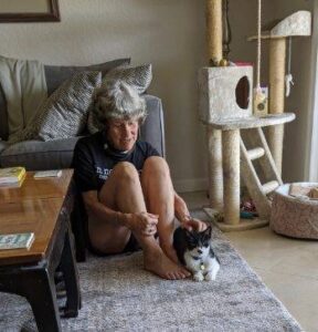 karen satz sitting with her cat