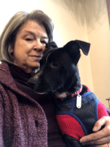 suzanne golden with her black dog